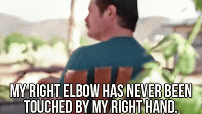 Man With Mustache Sitting In Chair GIF