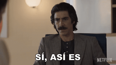 Man With Mustache Sitting In Chair With Netflix Logo GIF