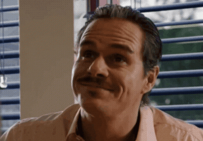 Man With Mustache Smiling At Camera GIF