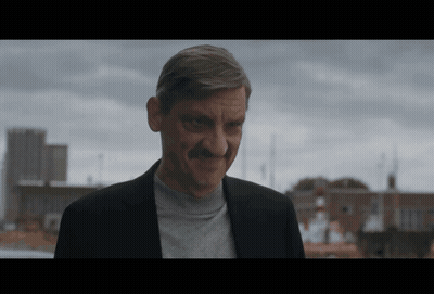 Man With Mustache Smiling City Skyline GIF