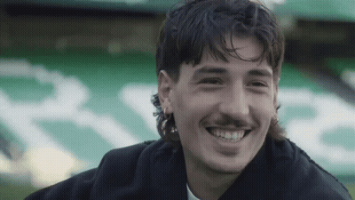Man With Mustache Smiling In Front Of R.E. Sign GIF