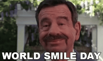 Man With Mustache Smiling World Smile Day GIF