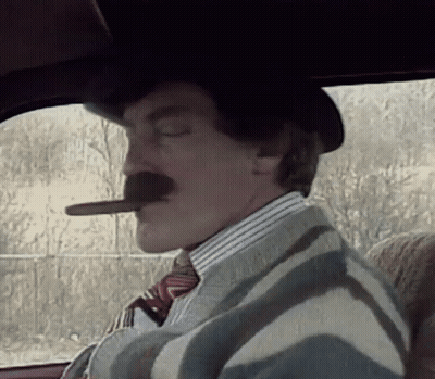 Man With Mustache Smoking Cigar Driving Car GIF