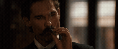 Man With Mustache Smoking Cigarette GIF