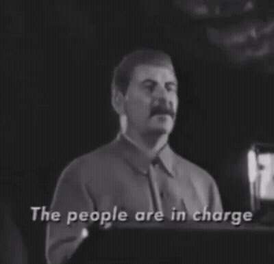 Man With Mustache Speaking Into Microphone That Is What We Call Socialism In Everyday Life GIF