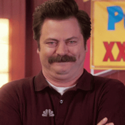 Man With Mustache Standing In Front Of Banner Saying P XX GIF