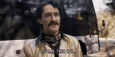 Man With Mustache Standing In Front Of Bus GIF