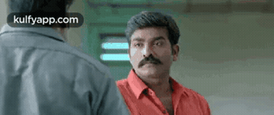 Man With Mustache Standing Next To Another Man GIF