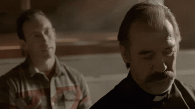 Man With Mustache Standing Next to Man Saying None Is Visible