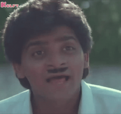 Man With Mustache Sticking Tongue Out GIF