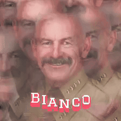 Man With Mustache Surrounded By Other Men And Bianco GIF