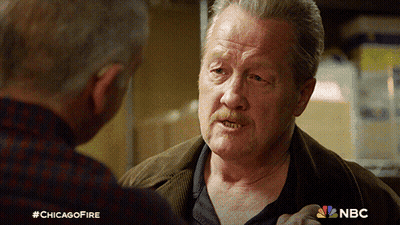 Man With Mustache Talking To Another Man #Chicagofire GIF