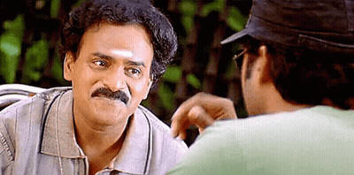 Man With Mustache Talking To Man With Hat GIF