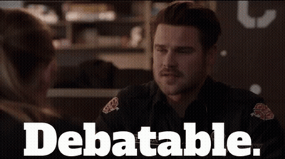 Man With Mustache Talking To Woman Debatable GIF