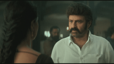 Man With Mustache Talking To Woman GIF