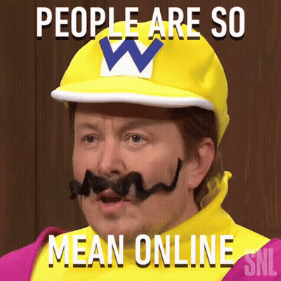 Man With Mustache Wario Hat Says People Are Mean GIF