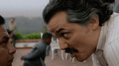 Man With Mustache Watching Knife Man GIF
