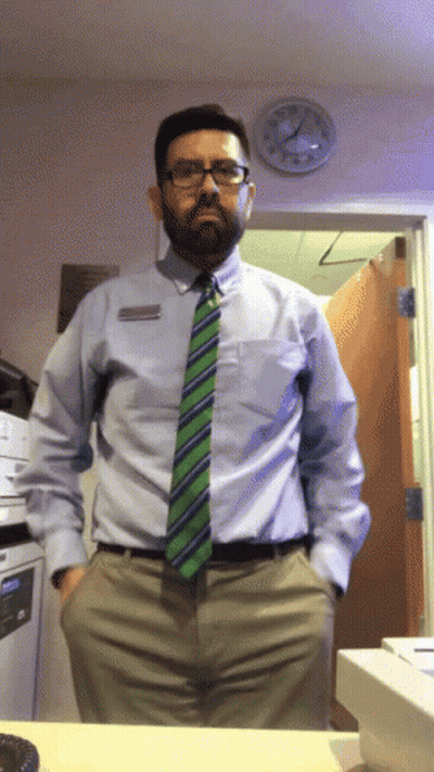 Man With Name Tag By Door GIF