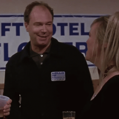 Man With Name Tag Saying Hello FM GIF
