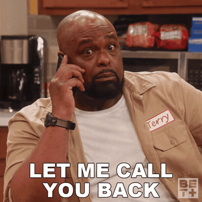 Man With Name Tag Terry On Phone GIF
