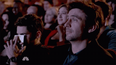 Man With NBC Shirt Watching Show GIF
