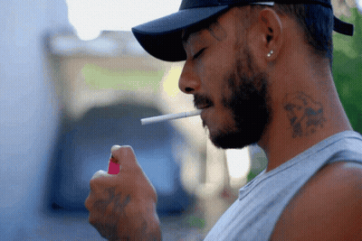 Man With Neck Tattoo Lighting Cigarette GIF