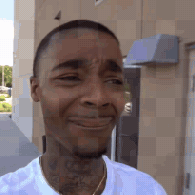 Man With Neck Tattoo Making Sad Face GIF
