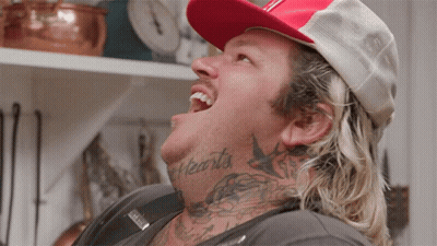 Man With Neck Tattoo Reading Hearts GIF