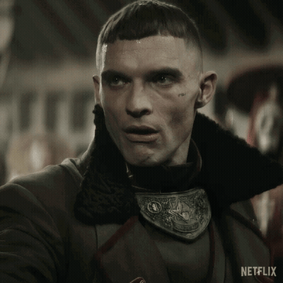 Man With Netflix Advertisement Behind Him GIF