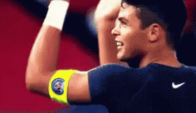 Man With Nike Logo Flexing Muscles GIF