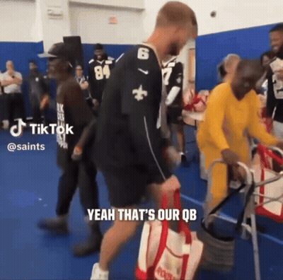 Man With Number 6 Jersey Walking With Walker GIF