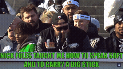 Man With Oakley Headband In Front Of Crowd GIF