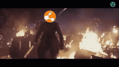 Man With Orange Circle Holding Sword GIF