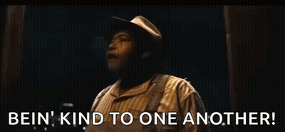 Man With Outstretched Arms Saying Be Kind GIF