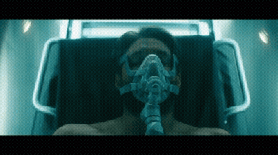 Man With Oxygen Mask Laying In Bed GIF