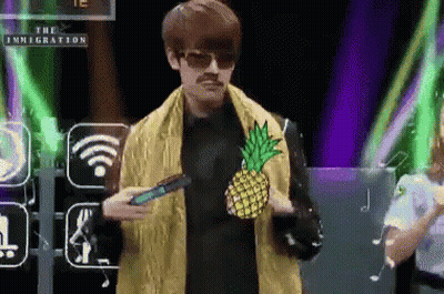 Man With Pineapple Jacket Holding Cell Phone GIF