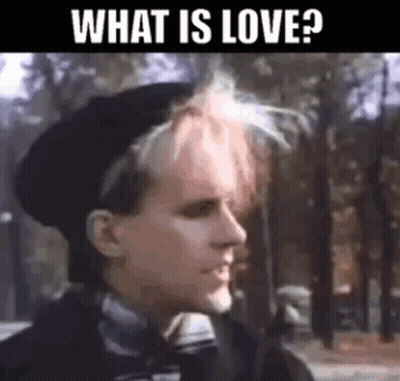 Man With Pink Hair And Black Beret Looking At Camera GIF