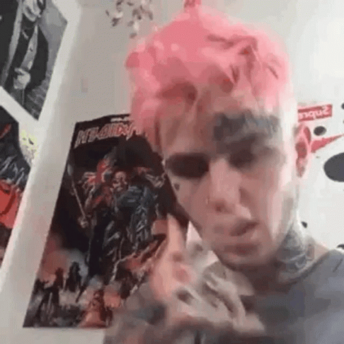 Man With Pink Hair And Face Tattoo GIF