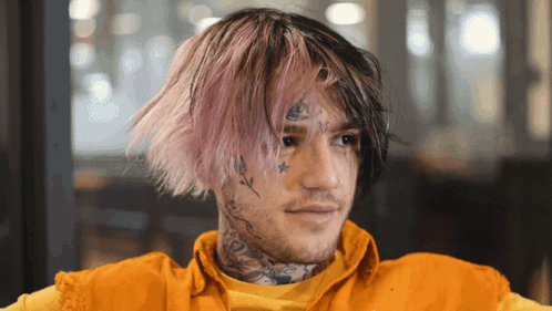 Man With Pink Hair And Face Tattoo GIF