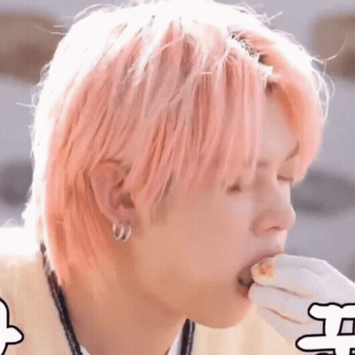 Man With Pink Hair Eating Food GIF