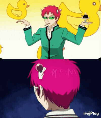 Man With Pink Hair Holding Cake And Rubber Duck GIF