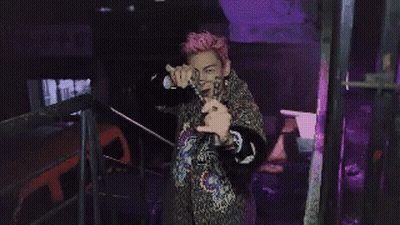 Man With Pink Hair Walking Down Stairs GIF