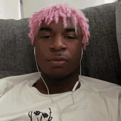 Man With Pink Hair Wearing Headphones And White Shirt With Dog GIF