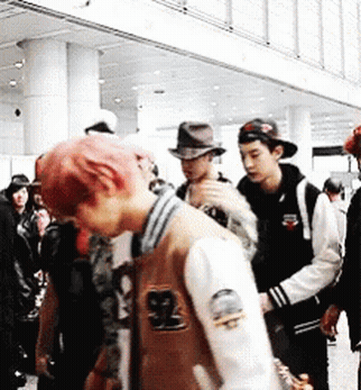 Man With Pink Hair Wearing Jacket Number 92 GIF
