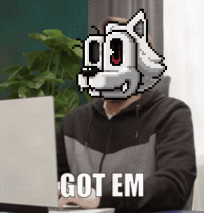 Man With Pixelated Wolf Head Laptop Saying Got Em GIF
