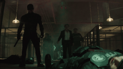 Man With Police Badge Pointing GIF
