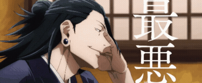Man With Ponytail And Earrings Smiling GIF