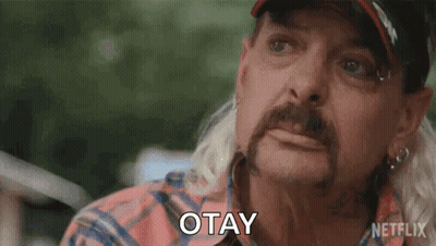 Man With Ponytail And Hat Saying Okay GIF