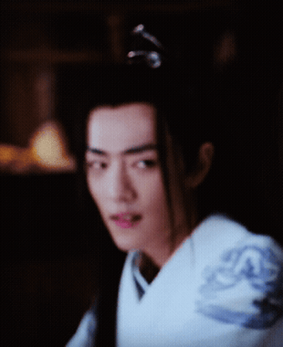 Man With Ponytail Close Up GIF