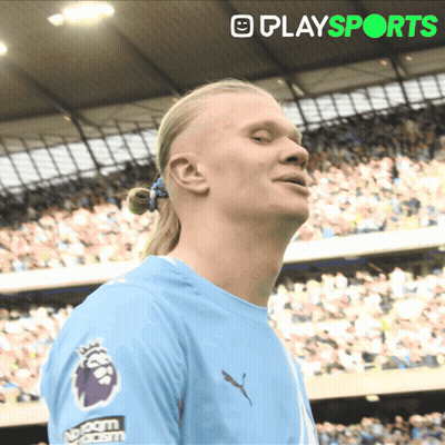 Man With Ponytail In Blue Shirt Saying Play Sports GIF